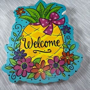 Cheerful and colorful pineapple “Welcome” wall plaque designed by Tina Wenke
